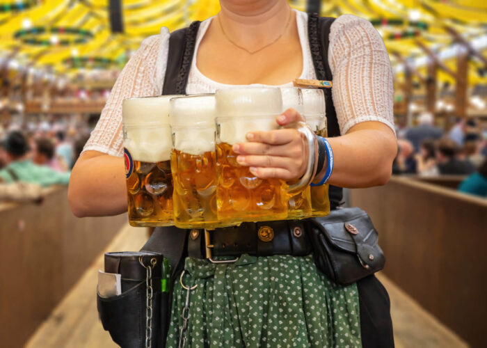 Close up of waitress with beer in festival