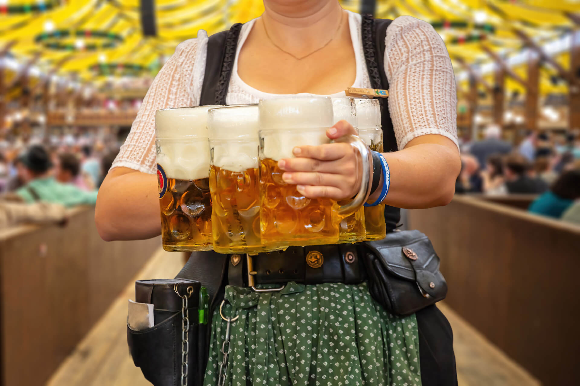 Close up of waitress with beer in festival