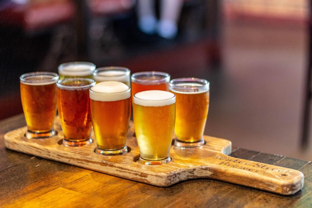 A tray of 7 beer cups