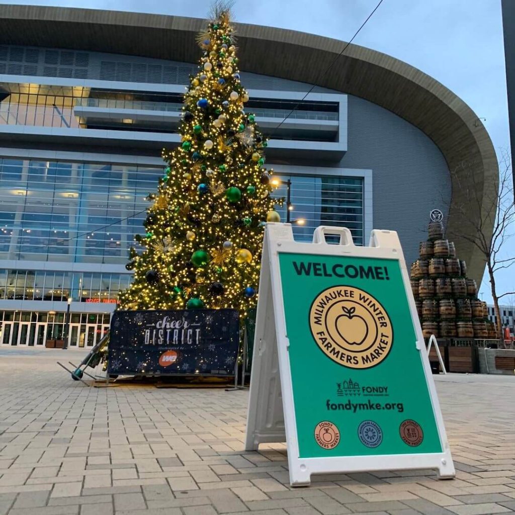 Milwaukee Winter Farmers Market entrance sign and Christmas tree