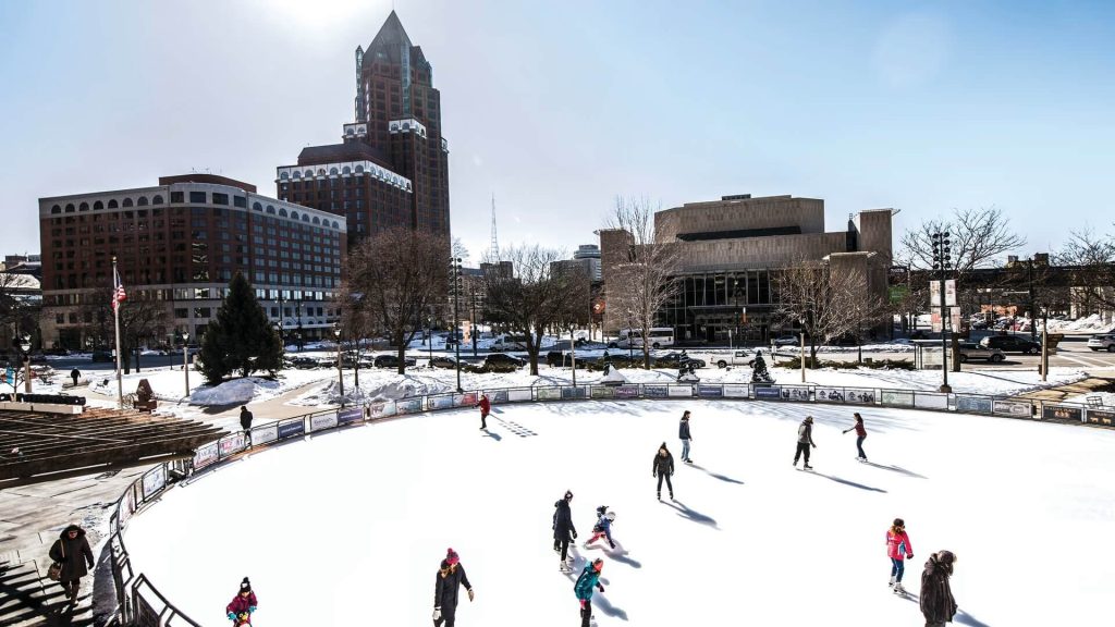 People skiing in Red Arrow Part Ice Rink