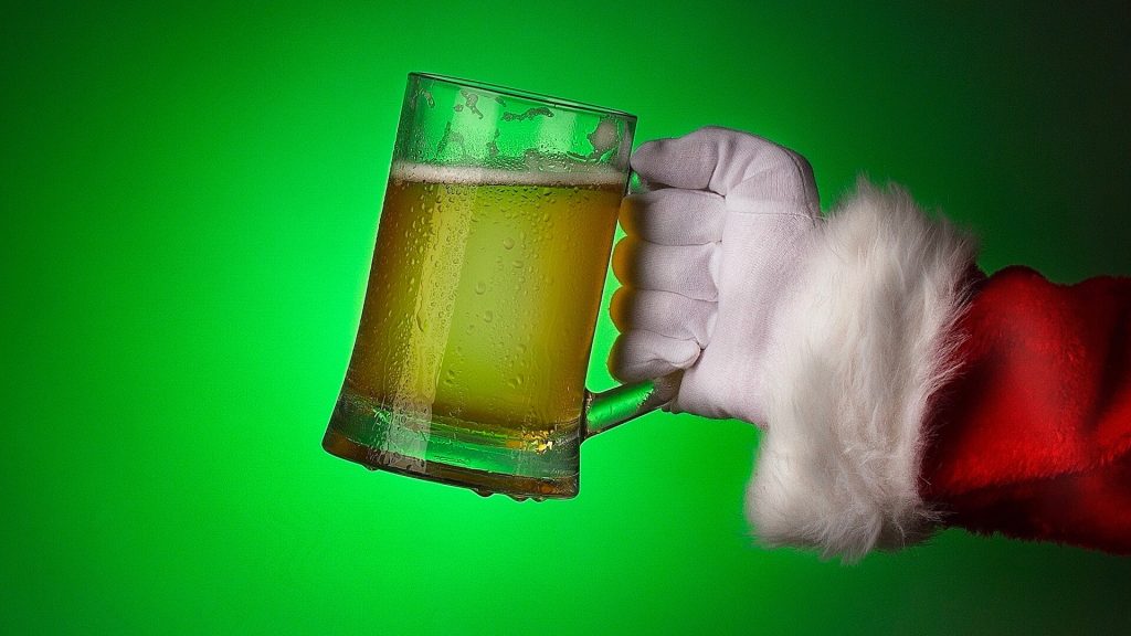 Santa Claus drinks beer
